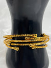 layered gold bangles, textured gold bracelets, elegant bangle set, stylish stacked bangles, women’s gold wrist jewelry, fashion bangles set, versatile gold