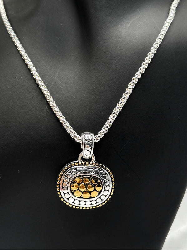 two-tone oval pendant necklacesilver and gold-tone necklaceelegant oval pendant jewelrywomen’s fashion statement necklaceversatile two-tone necklacebold frame pendant necklacetimeless silver and gold jewelrychic two-tone necklace for womenstatement pendant necklacetextured oval pendant two toneunique necklaceclassy necklace