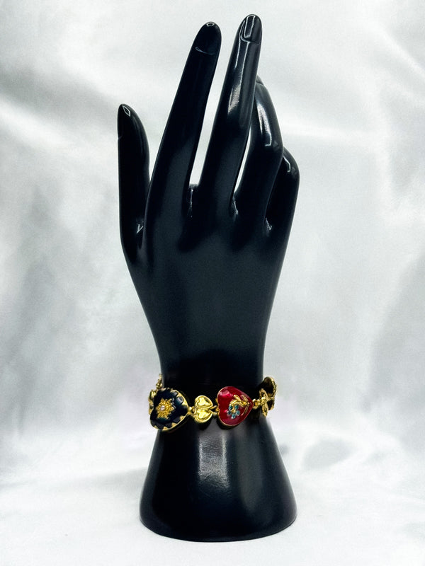 gold-tone heart charm necklacemulticolored heart necklaceenamel heart pendant necklacebold statement necklacewhimsical heart jewelry for womencolorful heart charm necklacetrendy gold-tone necklaceplayful fashion jewelryunique charm necklacewomen’s colorful statement necklace