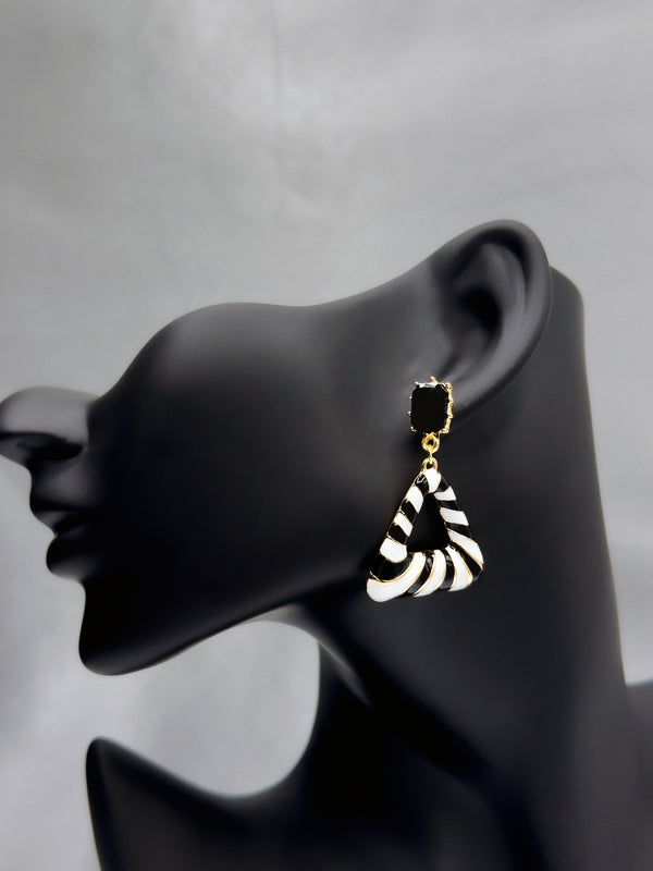 Wild Whisper earringsZebra print earringsBlack and white geometric earringsAnimal print statement earringsTriangular drop earrings for womenBold fashion earrings with zebra patternUnique black stone and animal print earrings
