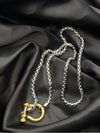 dual-tone clasp necklacegold and silver necklaceindustrial clasp pendant necklacebold fashion necklaceedgy silver and gold jewelrymixed metal necklace for womenunique clasp jewelrymodern statement necklacewomen’s dual-tone chain necklacetrendy gold and silver necklace