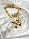 gold-tone cross pendant necklacetextured cross jewelrybold statement cross necklaceunique gold cross necklace for womenreligious fashion jewelrychunky chain cross pendantstylish gold-tone jewelryspiritual necklace for womenluxury cross necklaceintricate cross pendant designstatement necklaceunique necklace