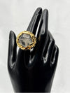 Clear stone encased in intricate, textured gold setting. Earthy feel. bold statement ringone size ringvacation ringdeep blue stonetextured gold settingnatural designunique ring