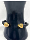 black and gold cuff bracelet, Eternal Oak bracelet, twisted cable bracelet, luxury black bracelet with gold caps, nature-inspired jewelry, statement cuff bracelet, modern twist bangle