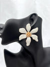  ivory flower earrings, blossom earrings, floral stud earrings, white petal earrings, nature-inspired jewelry, wedding statement earrings, elegant floral jewelry
