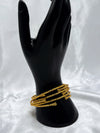  layered gold bangles, textured gold bracelets, elegant bangle set, stylish stacked bangles, women’s gold wrist jewelry, fashion bangles set, versatile gold 