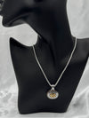 two-tone oval pendant necklacesilver and gold-tone necklaceelegant oval pendant jewelrywomen’s fashion statement necklaceversatile two-tone necklacebold frame pendant necklacetimeless silver and gold jewelrychic two-tone necklace for womenstatement pendant necklacetextured oval pendant two toneunique necklaceclassy necklace