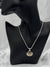 two-tone oval pendant necklacesilver and gold-tone necklaceelegant oval pendant jewelrywomen’s fashion statement necklaceversatile two-tone necklacebold frame pendant necklacetimeless silver and gold jewelrychic two-tone necklace for womenstatement pendant necklacetextured oval pendant two toneunique necklaceclassy necklace